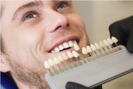 2E.-Man-in-Chair-Checking-Veneers
